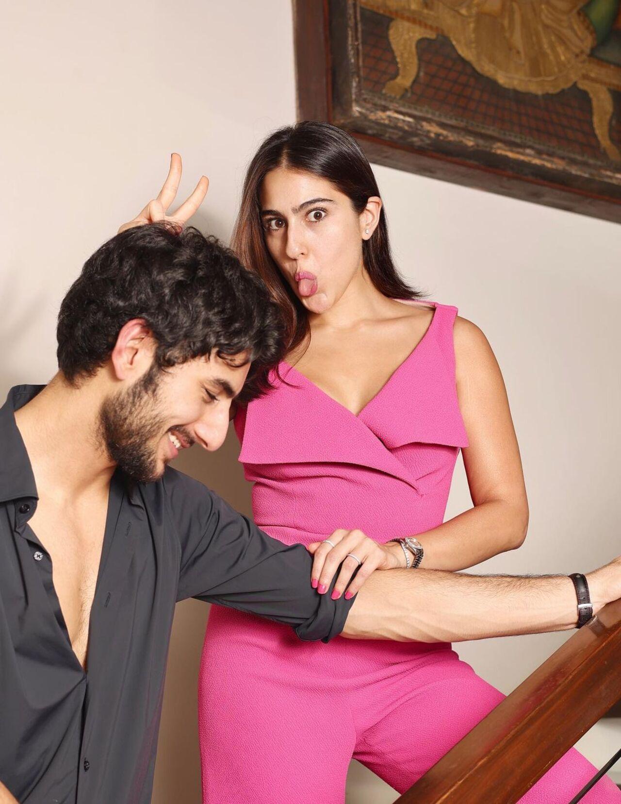 In this adorable photograph, Sara playfully imitates horns on Ibrahim's head, making him burst into laughter