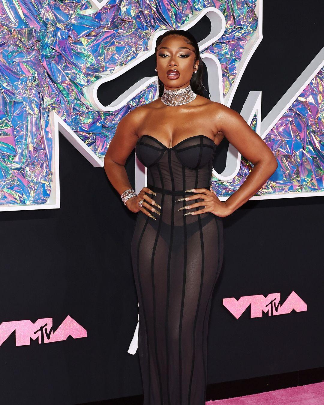 Megan Thee Stallion? Megan THE stallion. She served major fashion goals in this sheer black bodycon dress!