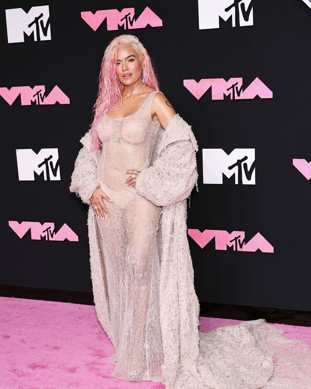 Sheer seemed to be the theme of the night. Karol G, opted for this sheer floor-length gown
