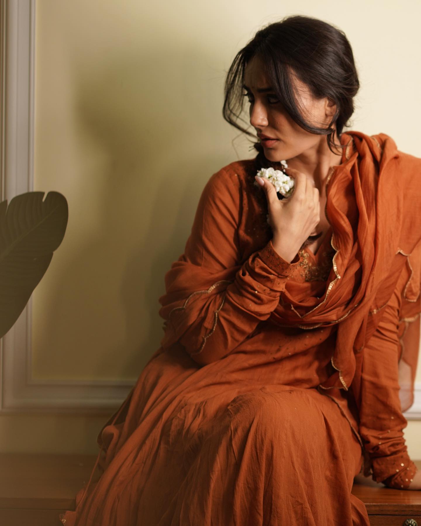 In this picture, Surbhi Jyoti donned an elegant orange suit with a matching dupatta