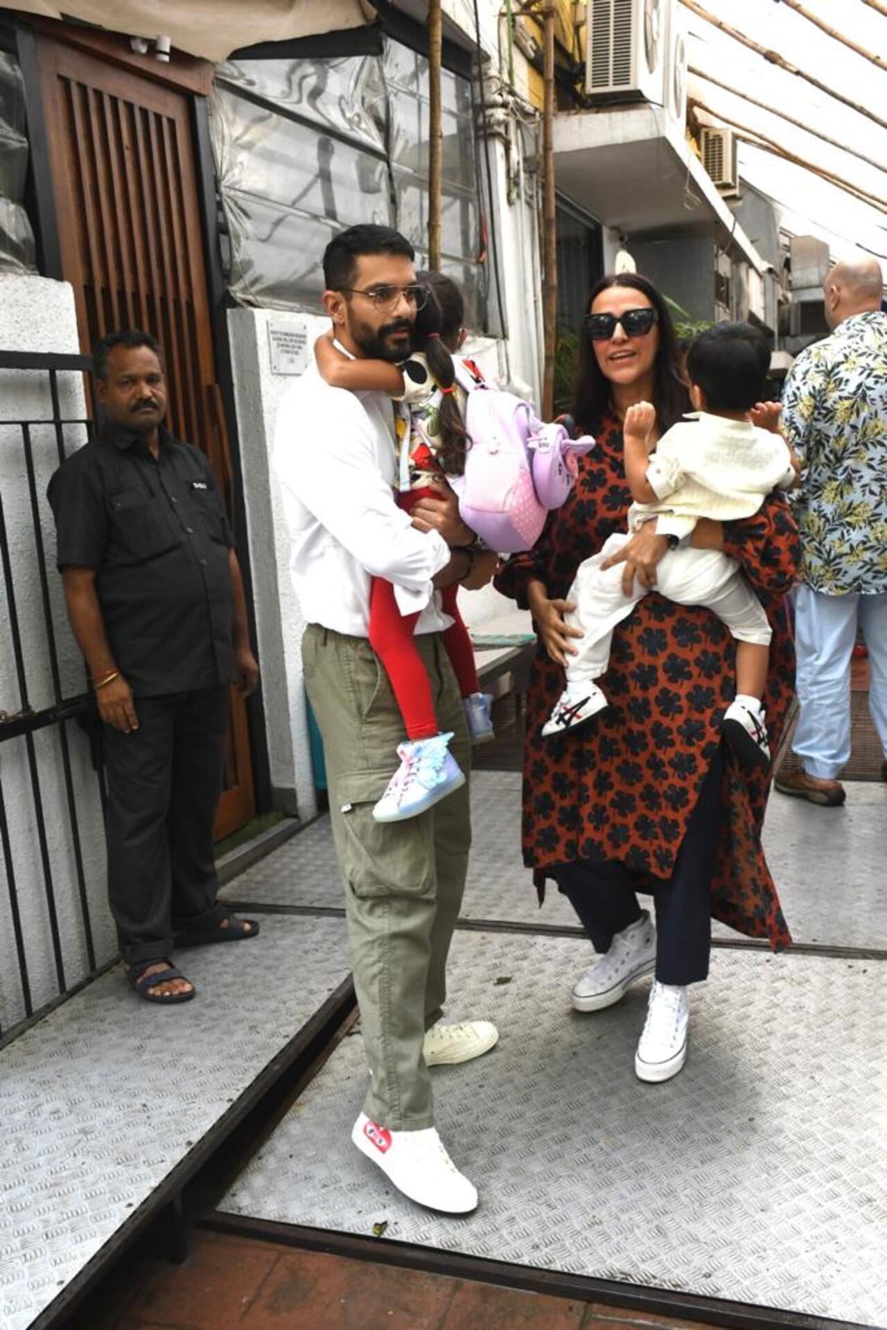 Neha Dhupia and Angad Bedi were clicked with their kids as they went out and about in the city
