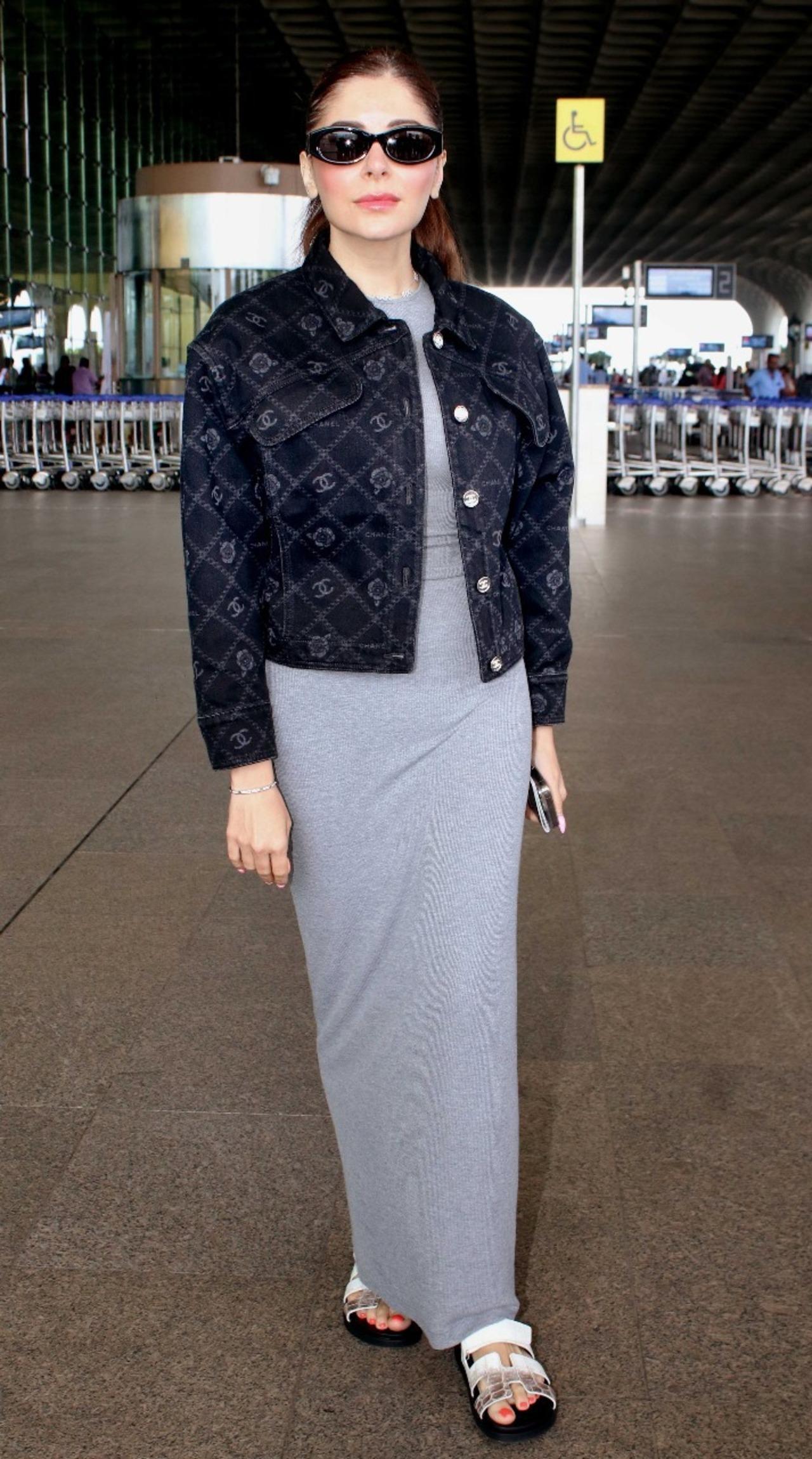 Kanika Kapoor was spotted at the airport, wearing a cool grey dress paired with black jacket