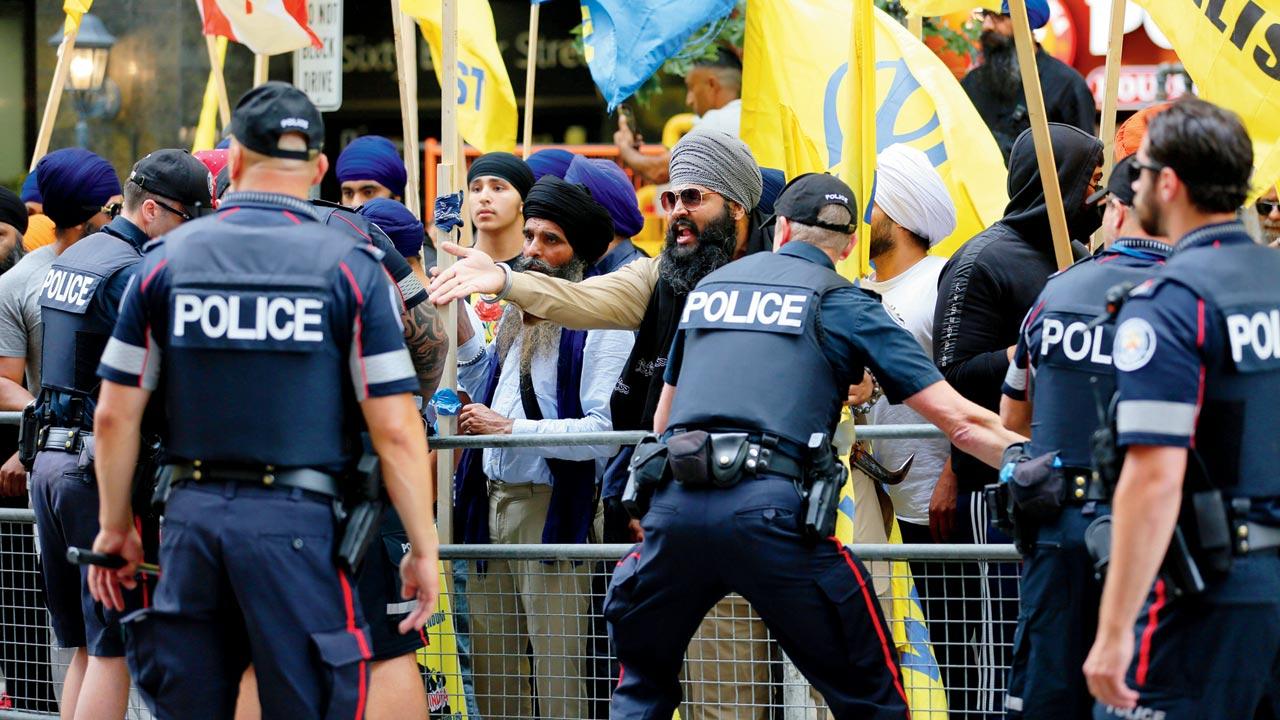 Khalistan supporters protest outside the Consulate General of India in Toronto, Canada earlier this month. Lakhs of Indians in Canada are currently living in fear as the two countries lock horns over the murder of Khalistan supporter Hardeep Singh Nijjar in Canada earlier this year