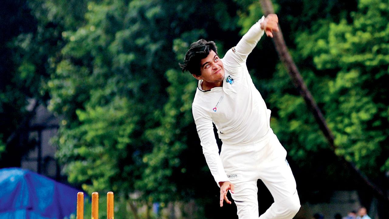 National CC’s left-arm spinner Akshay Darekar bowls v Regal CC at Cross Maidan on Sunday