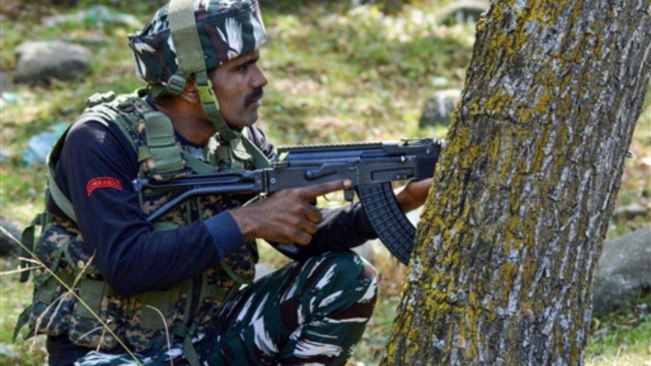 Footage from a drone showed a militant running for cover after a cave-like hideout was hit by shells fired by Indian security forces on Friday.