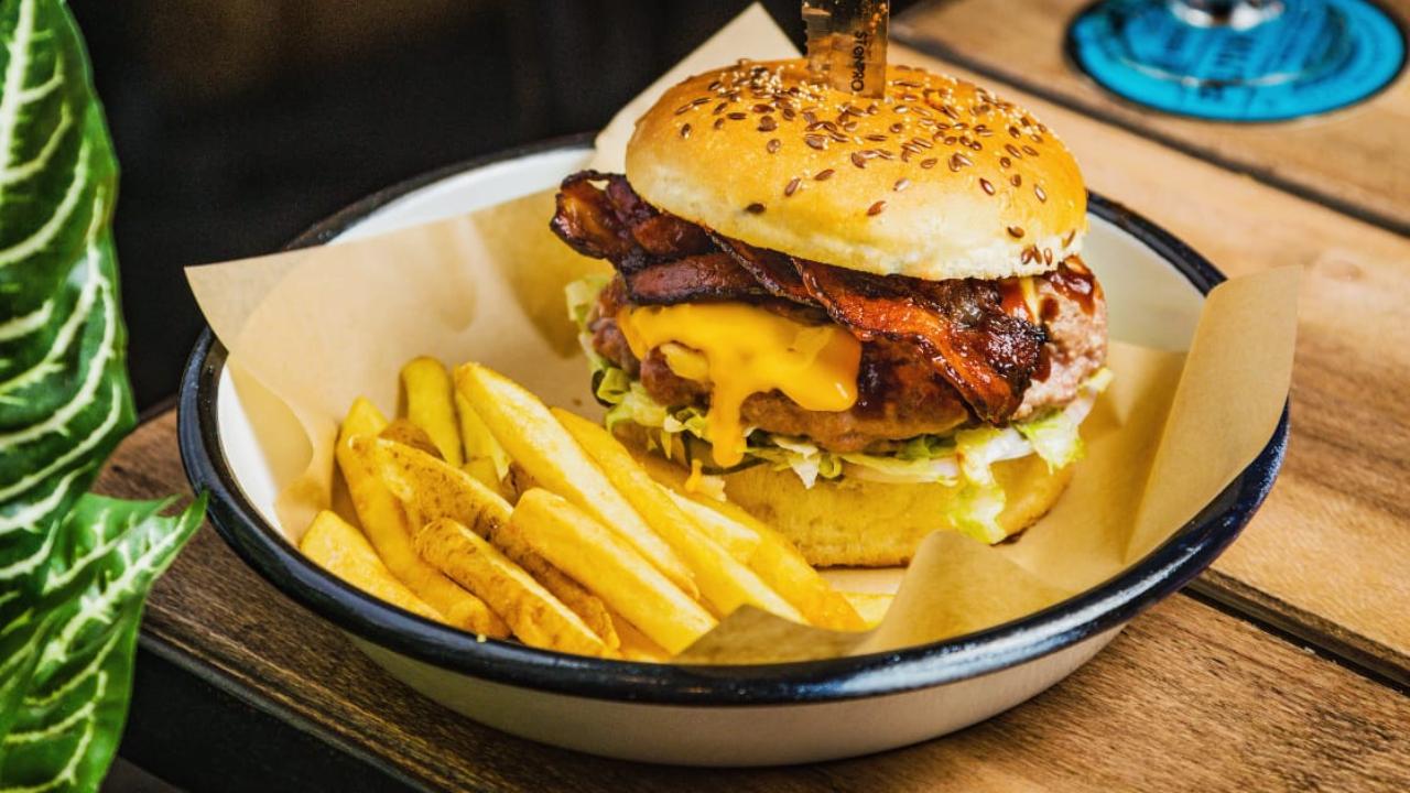 Love bacon but haven't indulged in a burger with bacon yet? Chef Roshan Seth at BrewDog India in Bandra and Lower Parel wants you to enjoy the flavours of apple wood smoked bacon. The applewood smoked bacon, that not only imparts a hint of smokiness but also the alluring richness which comes through the salty fat and meat of the bacon which rounds off the burger. Photo Courtesy: BrewDog India