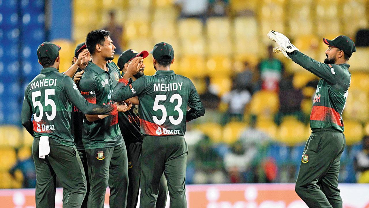 Bangladesh players celebrate after dismissing Ravindra Jadeja. Pic/AFP