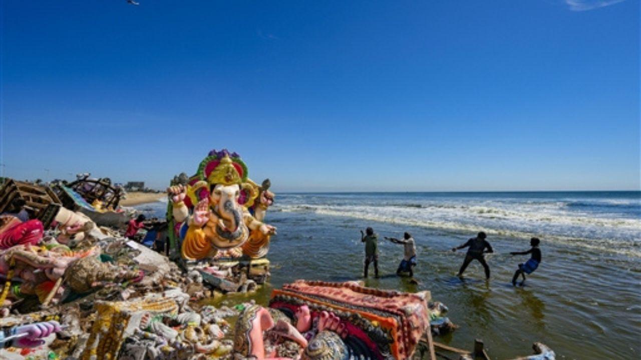 A day after devotees in Chennai bid heartfelt farewell to Lord Ganesha, idols of the elephant god drifted ashore the Pattinapakkam beach. Pics/PTI