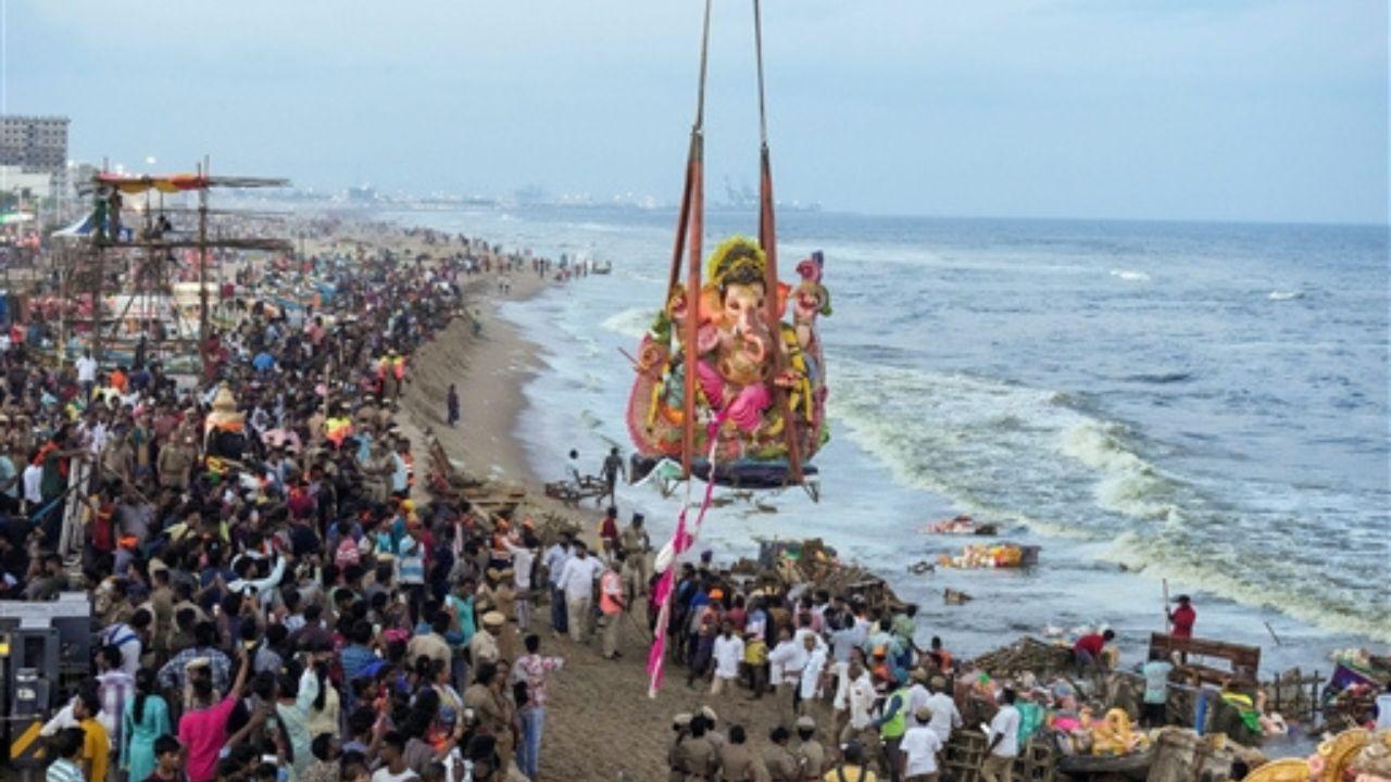 The administration had deployed cranes to facilitate the transportation of large Ganesha idols to the seashore for immersion.