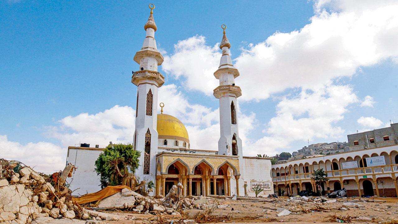 A mosque in Derna stands tall, seemingly unharmed. Pic/AP