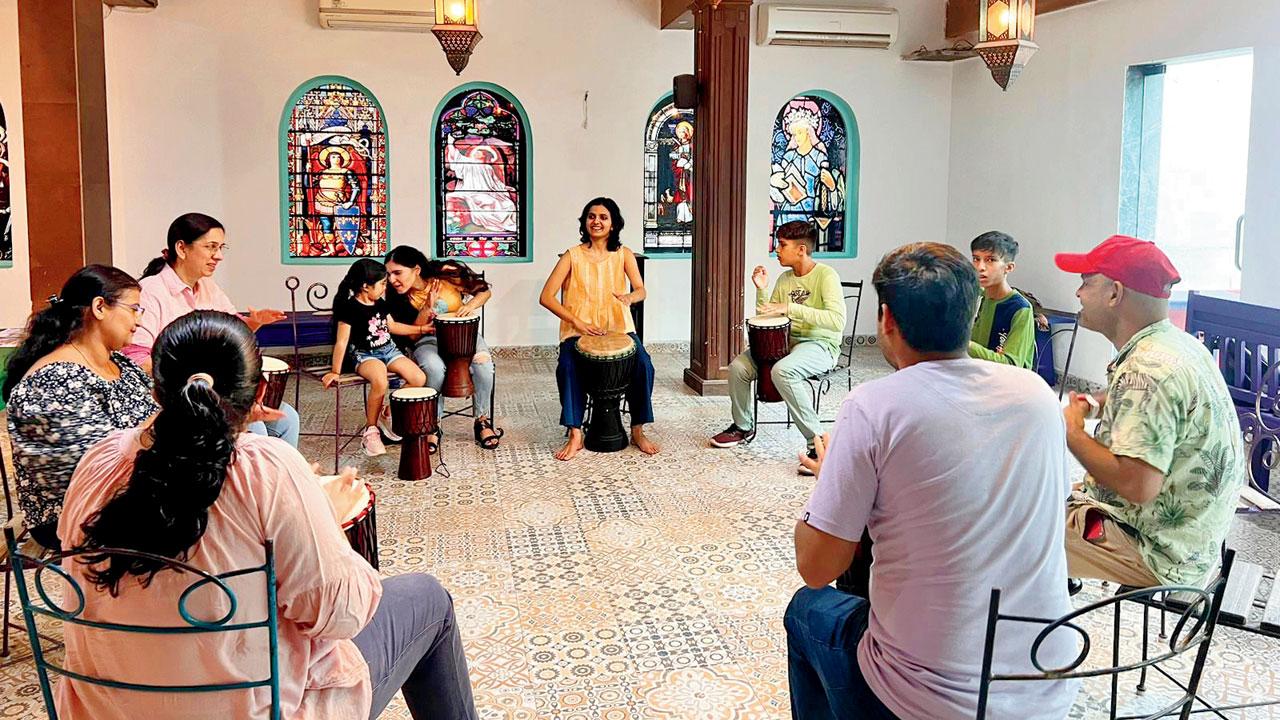 Participants gather at a recent drum circle in the new space