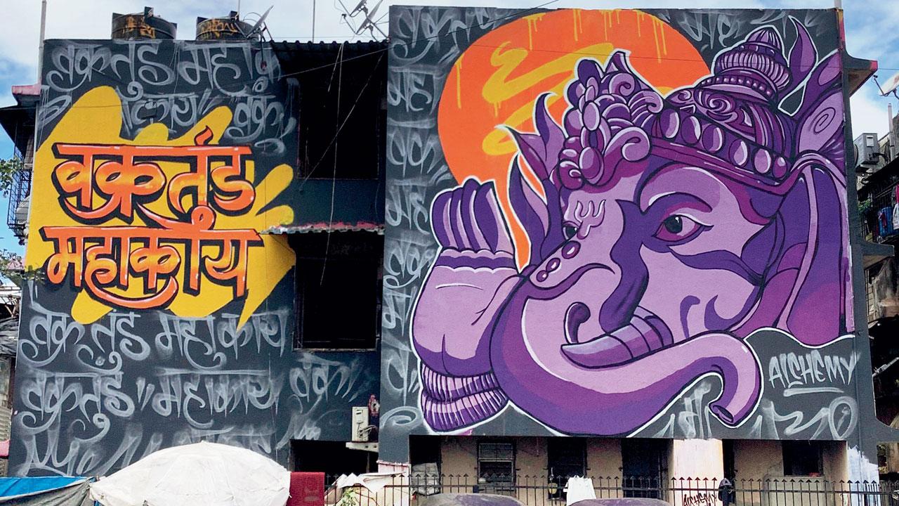 The mural features the distinctive façade of Lord Ganesha with a Sanskrit verse