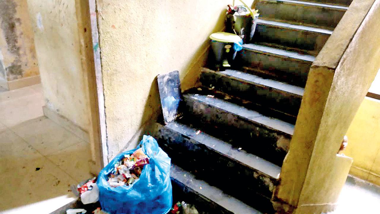 Garbage strewn on a staircase in the hostel near the Namrata Acharya English School and Junior College in Shelu taluka, Karjat