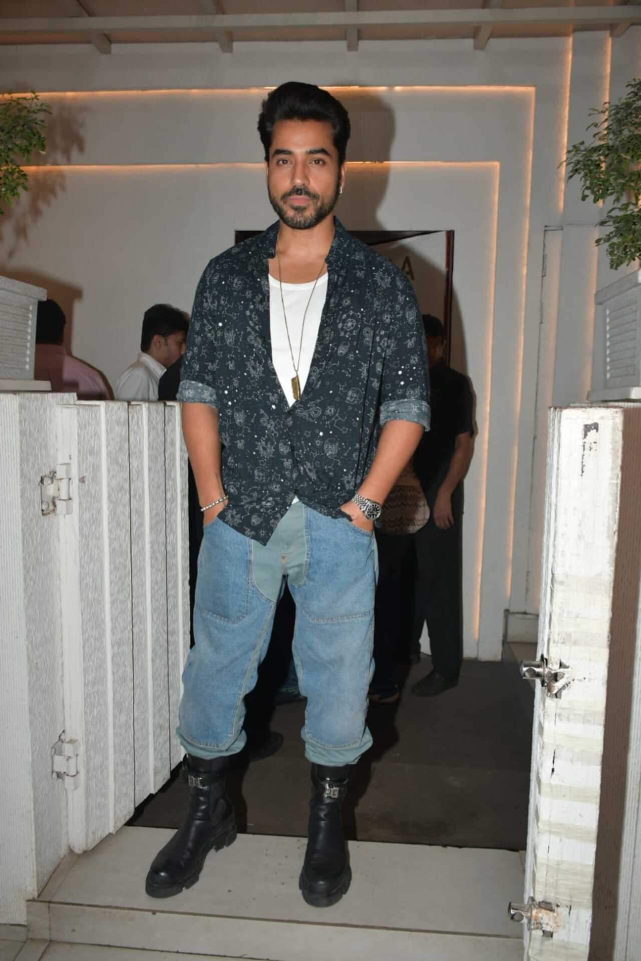 Gautam Gulati was at Akansha's birthday party. He wore a white T-shirt, jeans and a jacket