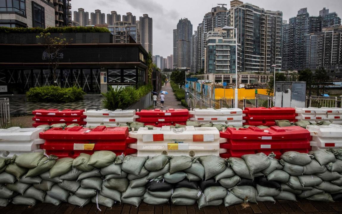 In Photos: Hong Kong comes to near standstill as typhoon edges closer