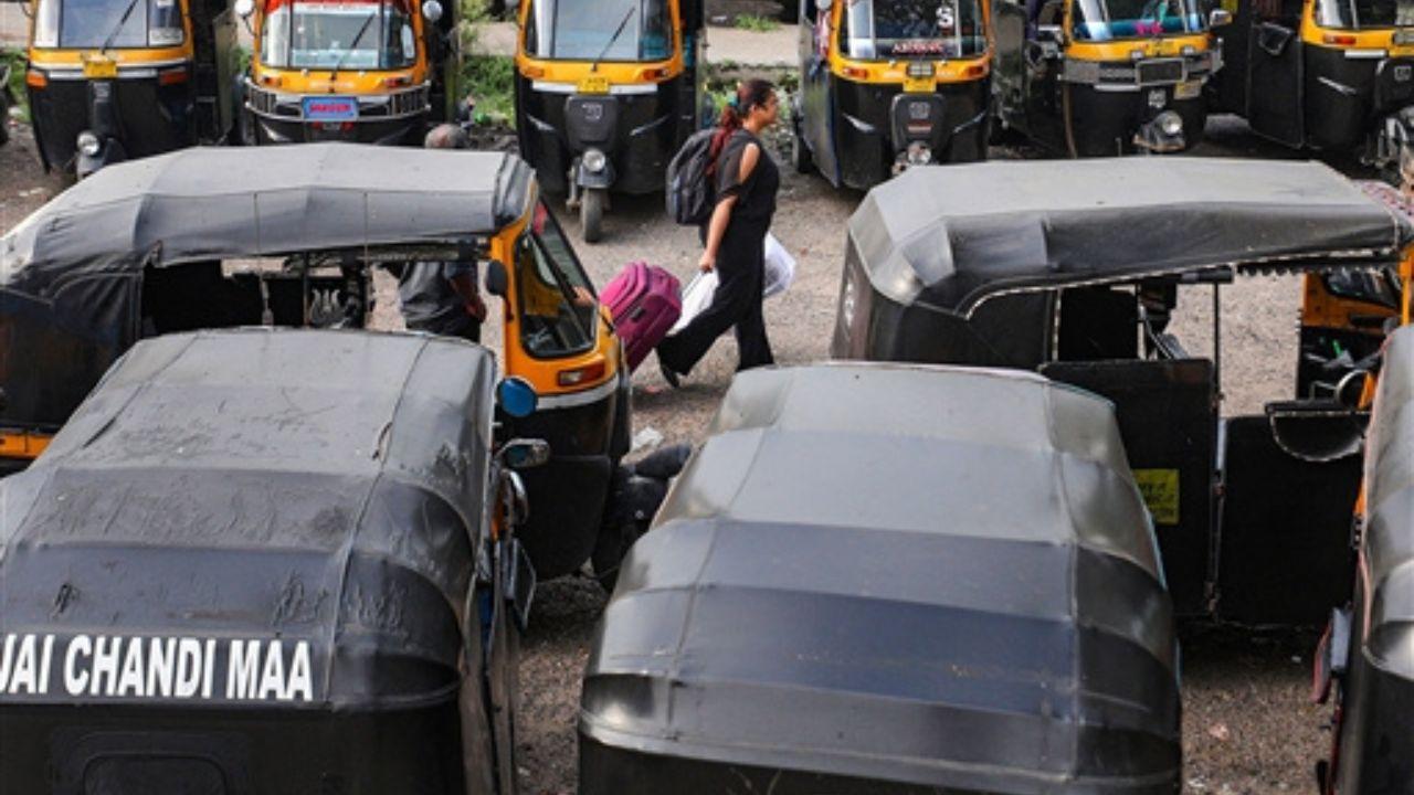 A striking photograph from the union territory showed a woman walking through parked rickshaws outside the railway station. 