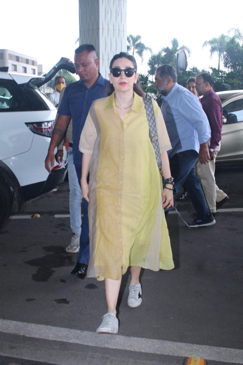 Karisma Kapoor chose a desi avatar as she donned a yellow kurta for her airport look