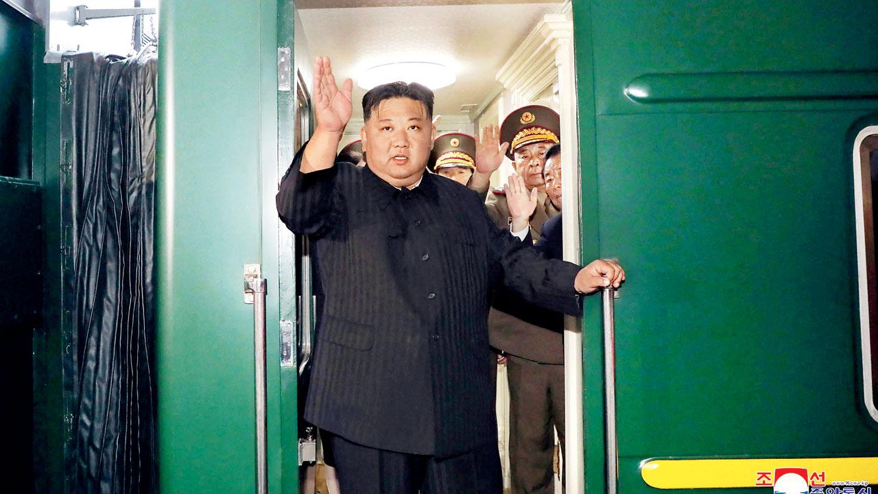 Kim waves as he departed from Pyongyang. Pic/AP