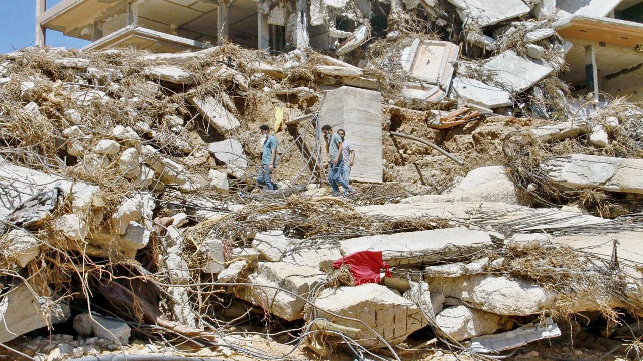 People look for survivors in Libya’s eastern city of Derna. Pics/AP