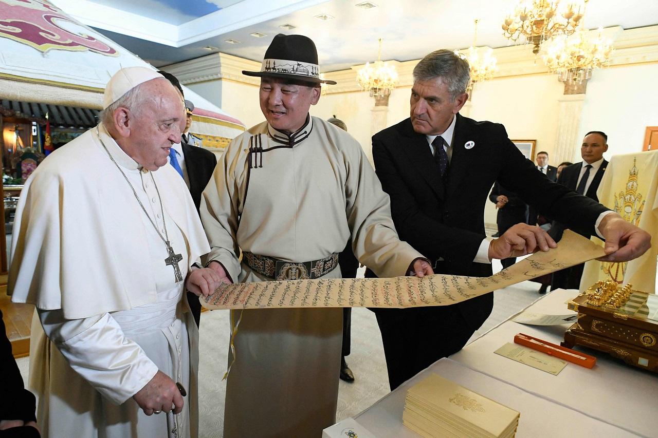 Pope Francis met with President Ukhnaagiin Khurelsukh inside a traditional Mongolian ger, or round yurt, set up inside the state palace, and wrote a message in the guest book that he was visiting Mongolia, 