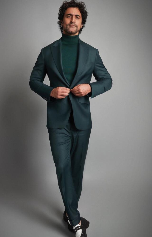 Kunal Kapoor, a master of styling, sizzled in a hot green three-piece suit, exuding undeniable charisma