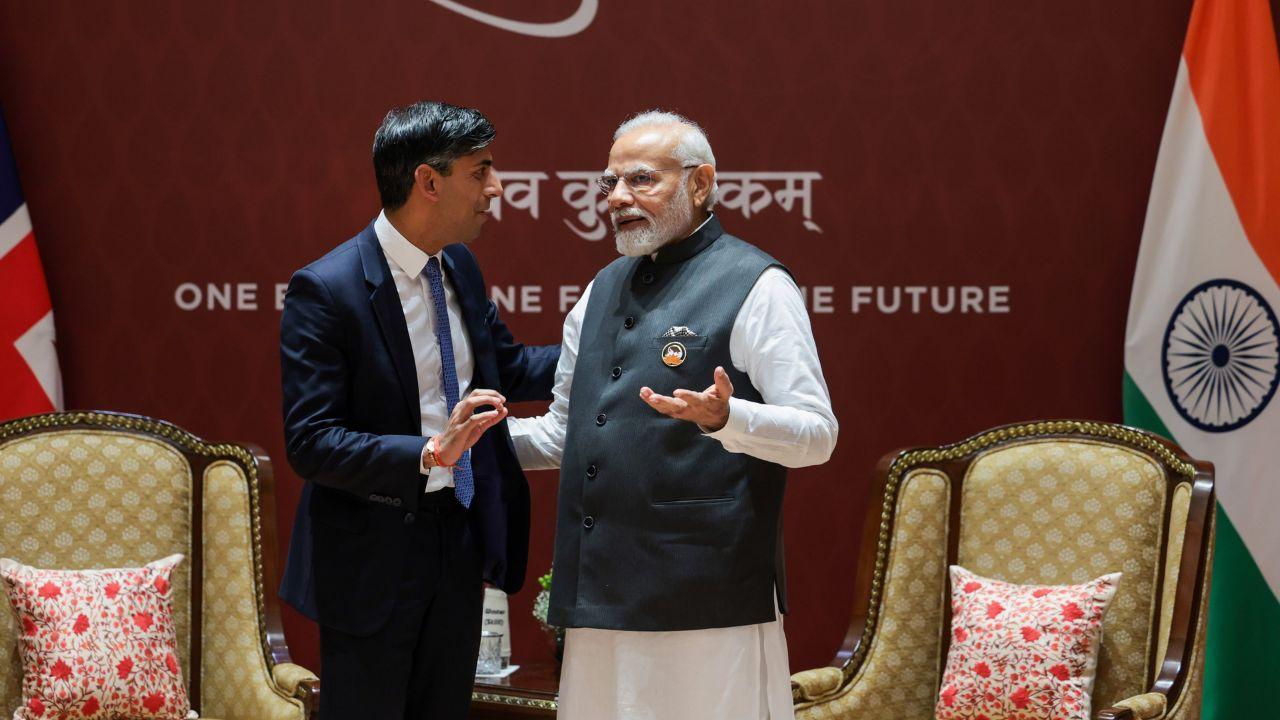 PM Modi took a moment to welcome Rishi Sunak at the venue and the two even posed holding hands.