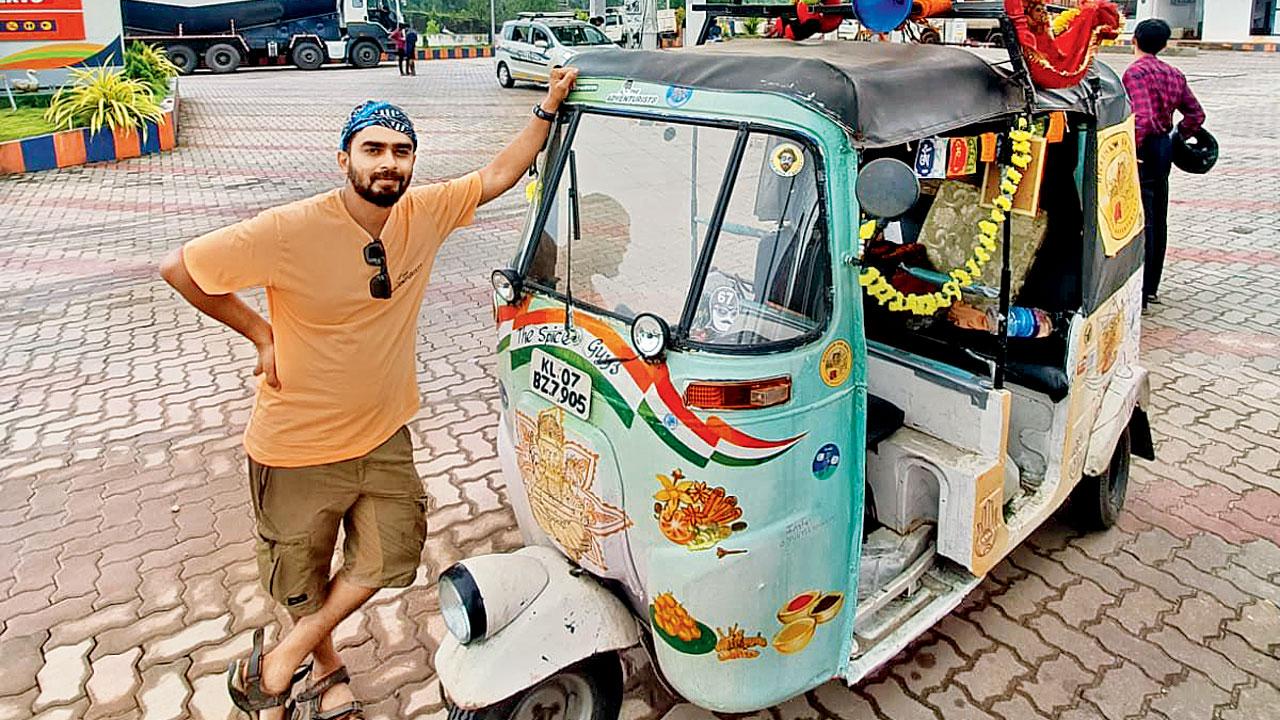 Omkar Dhareshwar with the revamped rickshaw he drove