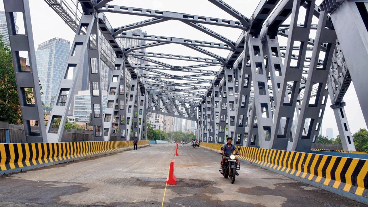 Two-way traffic was started on one side of the bridge. Pic/Ashish Raje