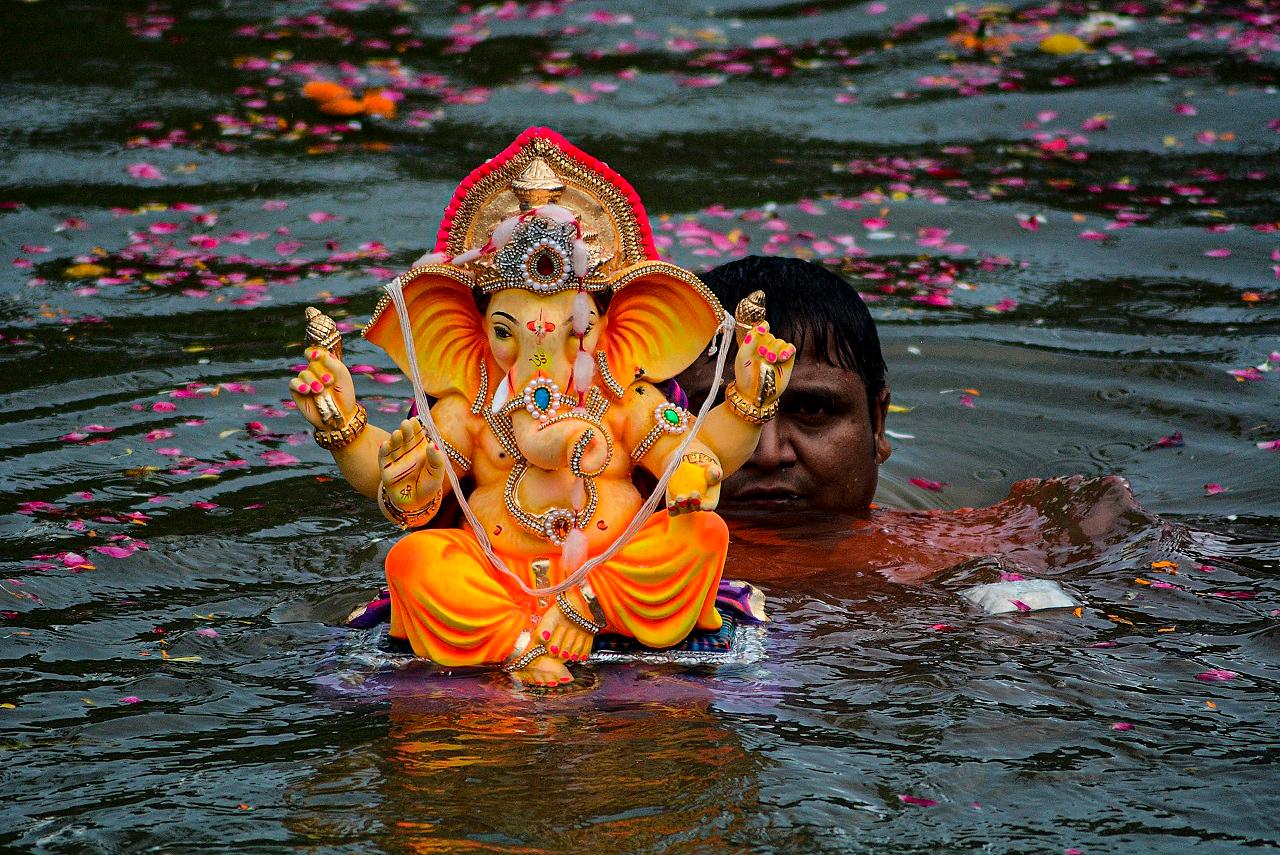 The idols were taken out and immersed amid chants of 