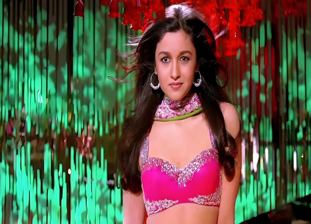 The song 'Radha' from the movie 'Student of the Year' is a lively Bollywood track that celebrates youthful love and romance. It features the characters expressing their admiration for the charming Radha