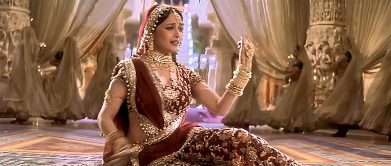 The lyrics express her longing for Devdas attention and affection. The choreography and music add to the emotional intensity of the scene, making it a pivotal moment in the film's narrative