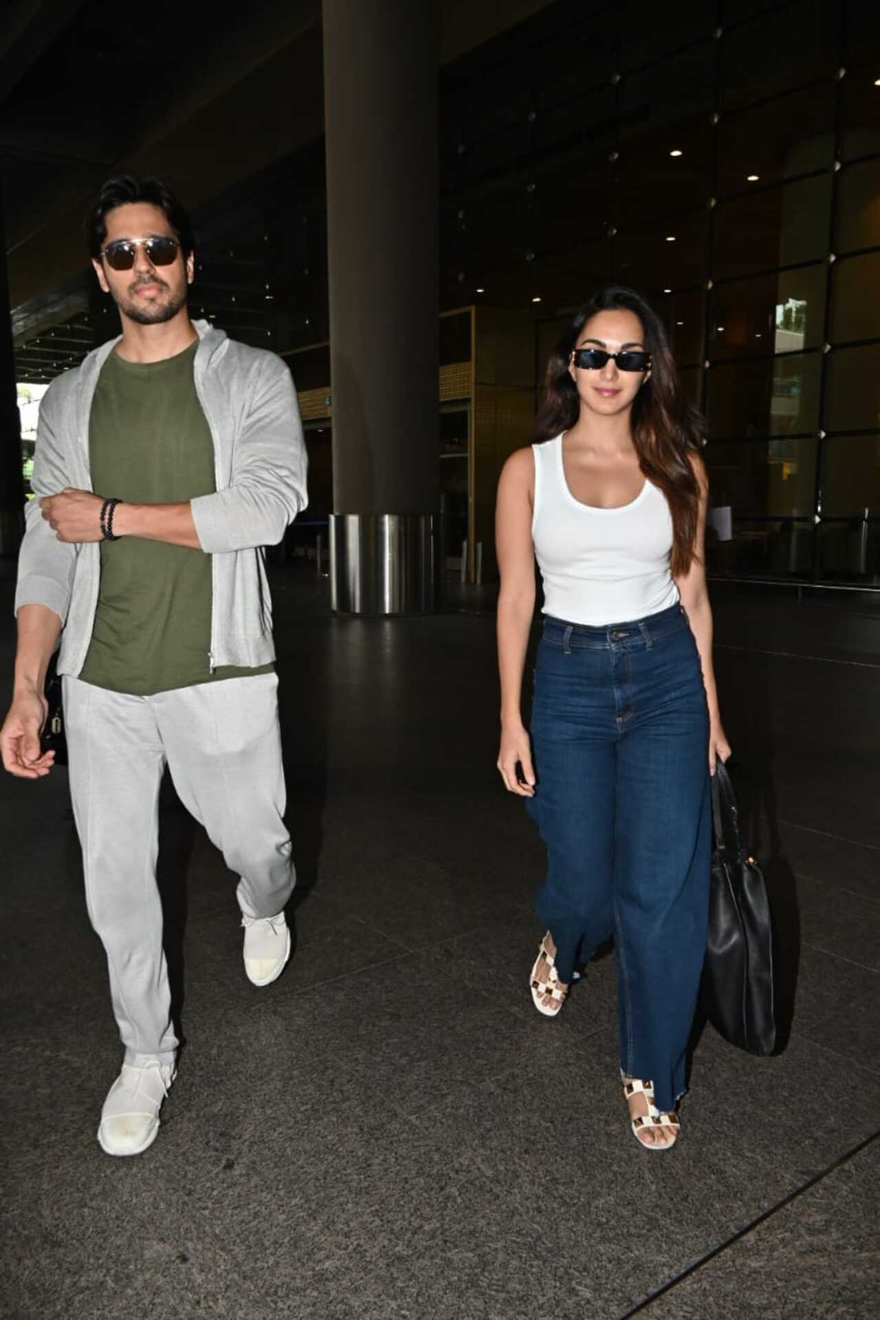 Kiara chose a simple white top coupled with blue denim jeans, while her husband Sidharth complemented her in a green T-shirt, grey jeans, and a stylish shirt