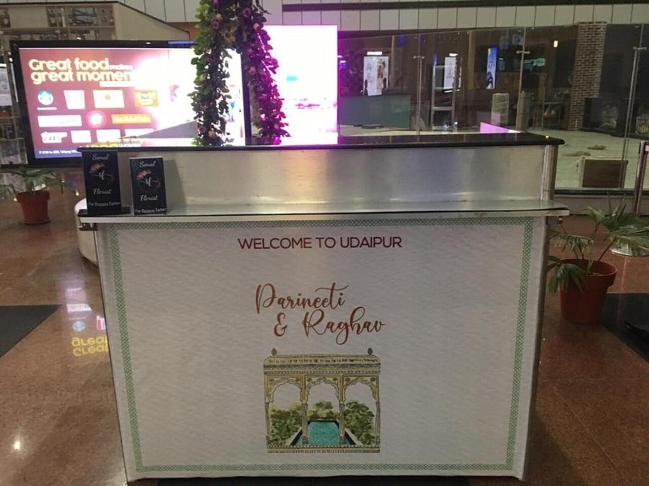 Another picture shows a counter welcoming Raghav and Parineeti to the city with graphics similar to the ones used in their wedding invites