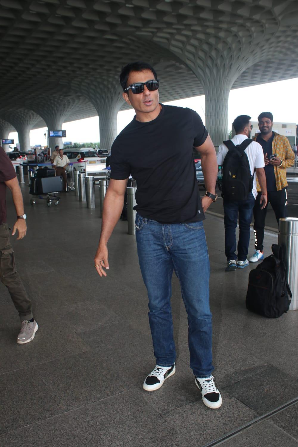 Sonu Sood was spotted at the airport wearing a stylish black T-shirt paired with blue jeans