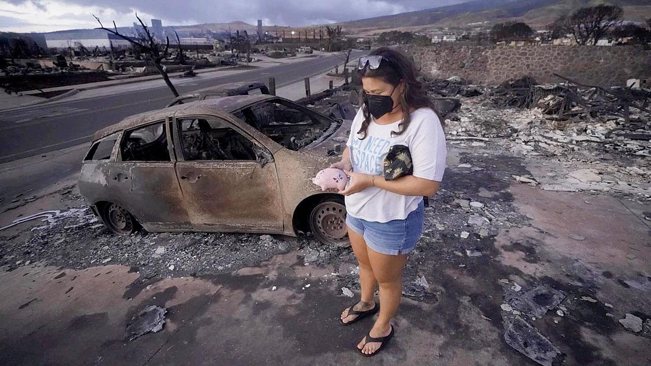 Residents return home after one of deadliest US wildfires