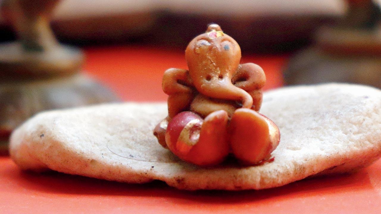 Among the Goel’s collection of Ganeshas are one-inch popcorn Ganeshas, which are made out of fibre.