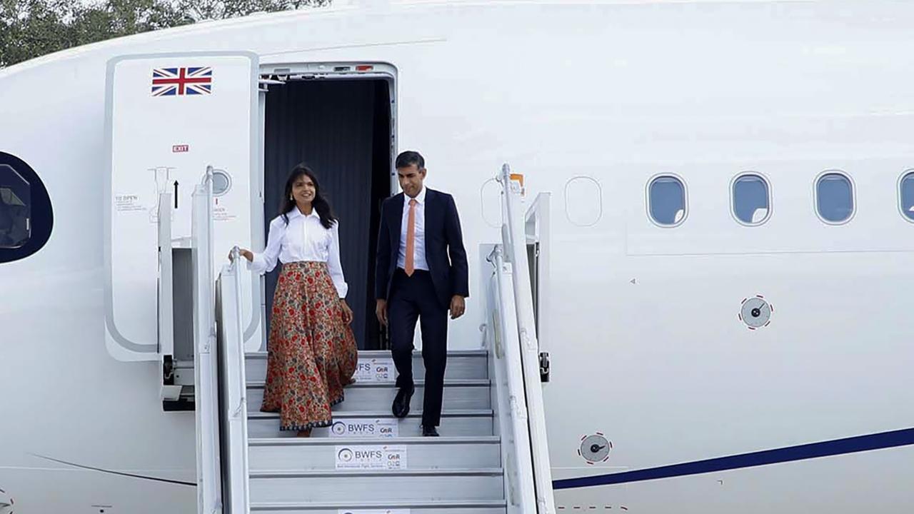 Prime Minister of the United Kingdom Rishi Sunak with his wife Akshata Murty being welcomed by Union Minister Ashwini Kumar Choubey upon his arrival at the airport ahead of the G20 Summit. Pics/PTI