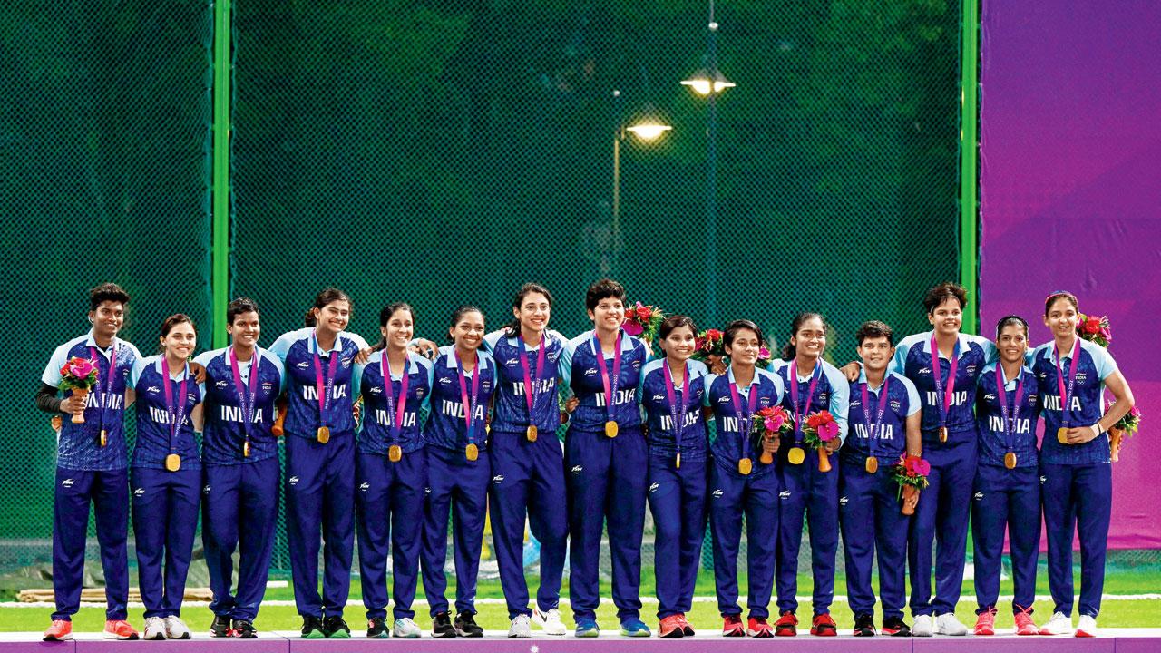 The Indian women’s cricket team on the podium after winning gold in Hangzhou yesterday. Pic/AFP