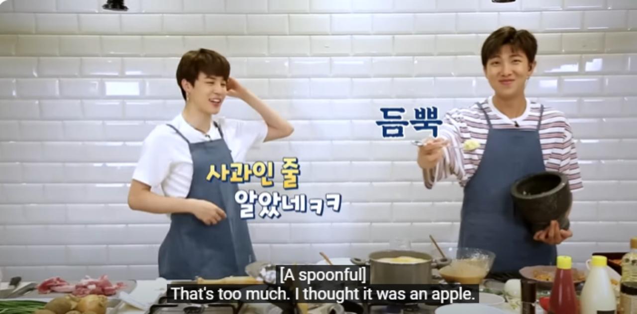 This episode gave us several laugh-out-loud moments courtesy clumsy Namjoon. One such instance was when he tried adding an 'apple-sized' portion of garlic (as Jin joked) into his dish - and ultimately added it to the wrong bowl! 