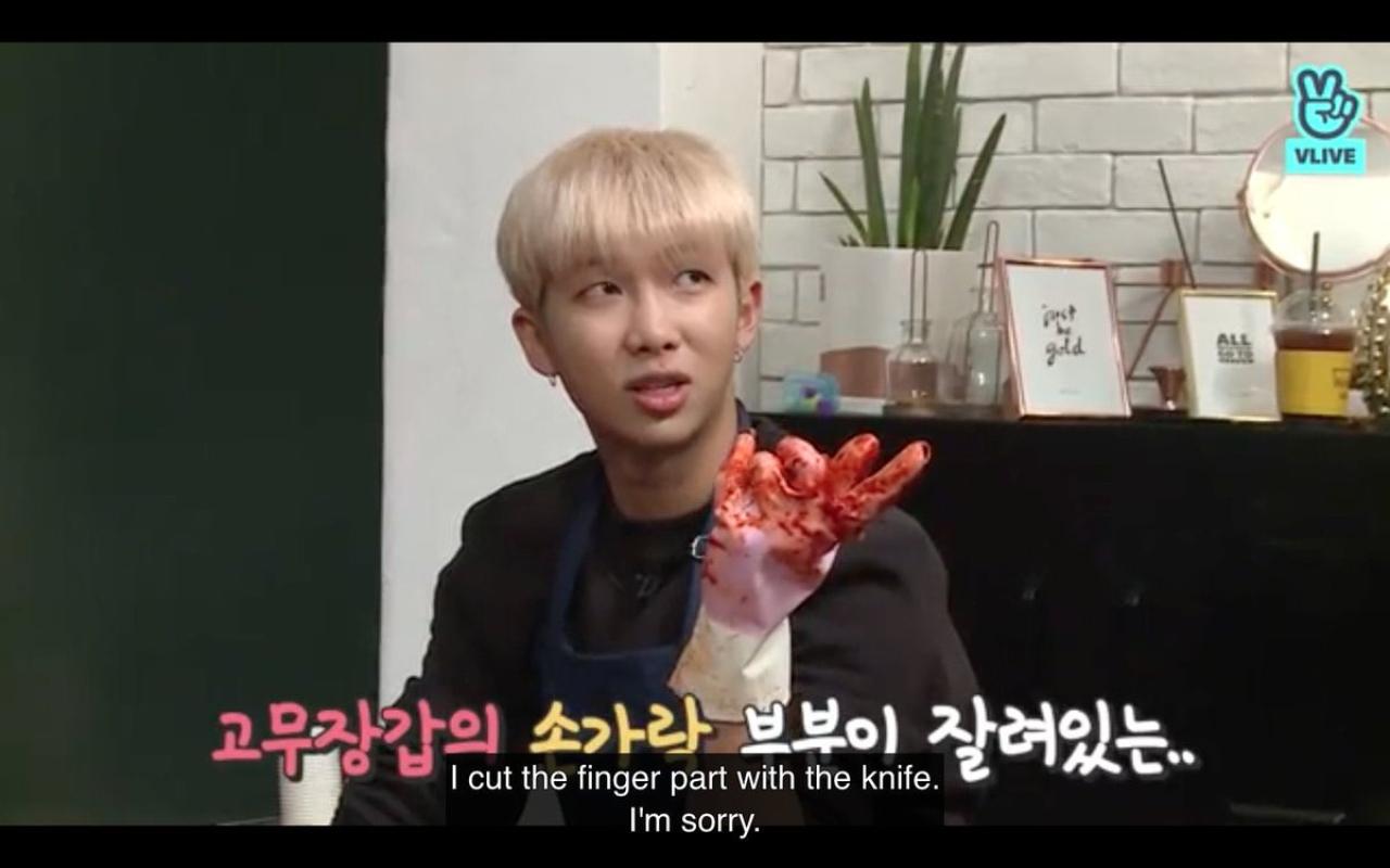 In another episode of BTS's variety show, the septet were tasked with making kimchi. While marinating the cabbage, RM somehow ended up tearing his gloves.