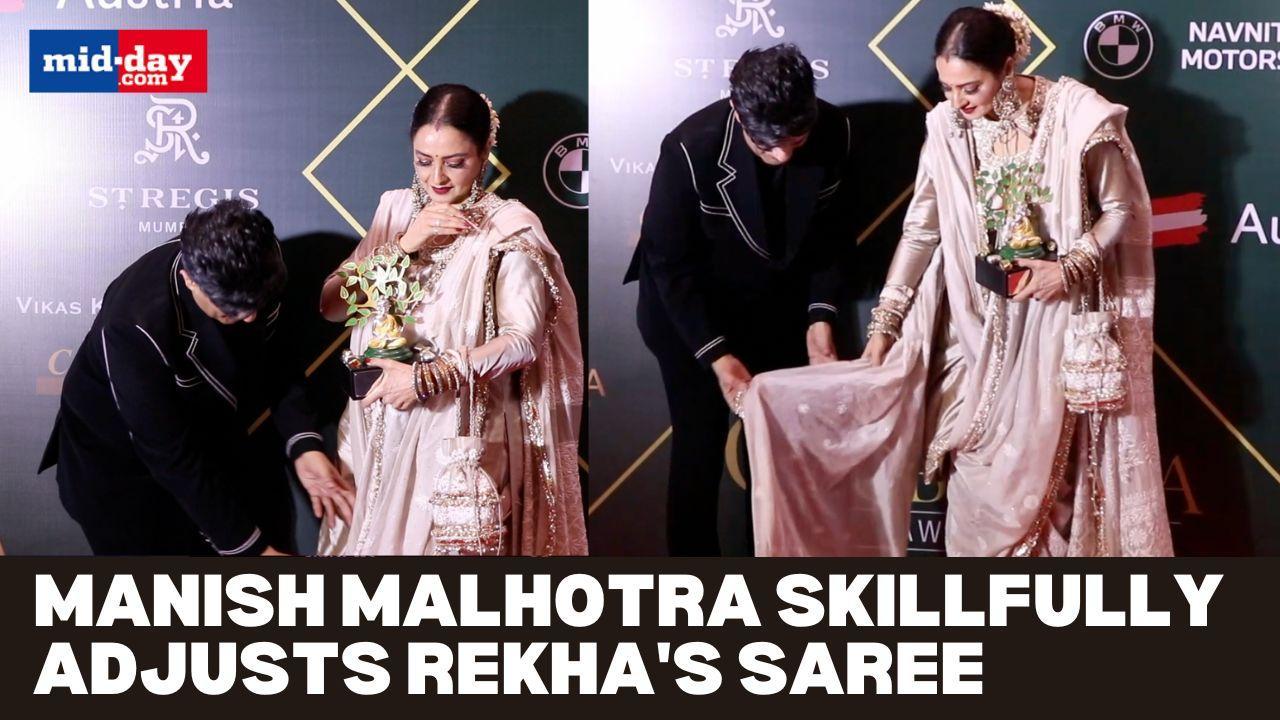 Ace Fashion Designer Manish Malhotra Fixes Rekha's Saree At An Award Function