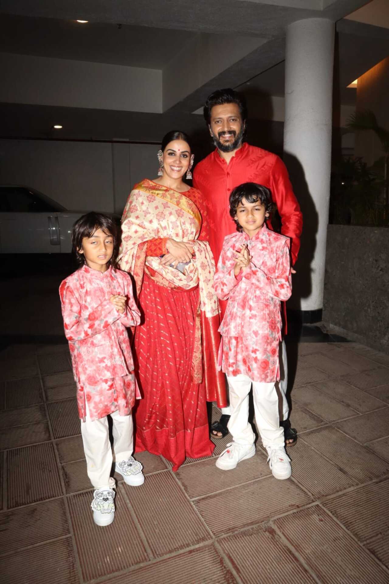 Riteish Deshmukh and Genelia Dsouza wore matching red outfits as they went to attend the Ganpati celebration at the Ambanis, along with their kids