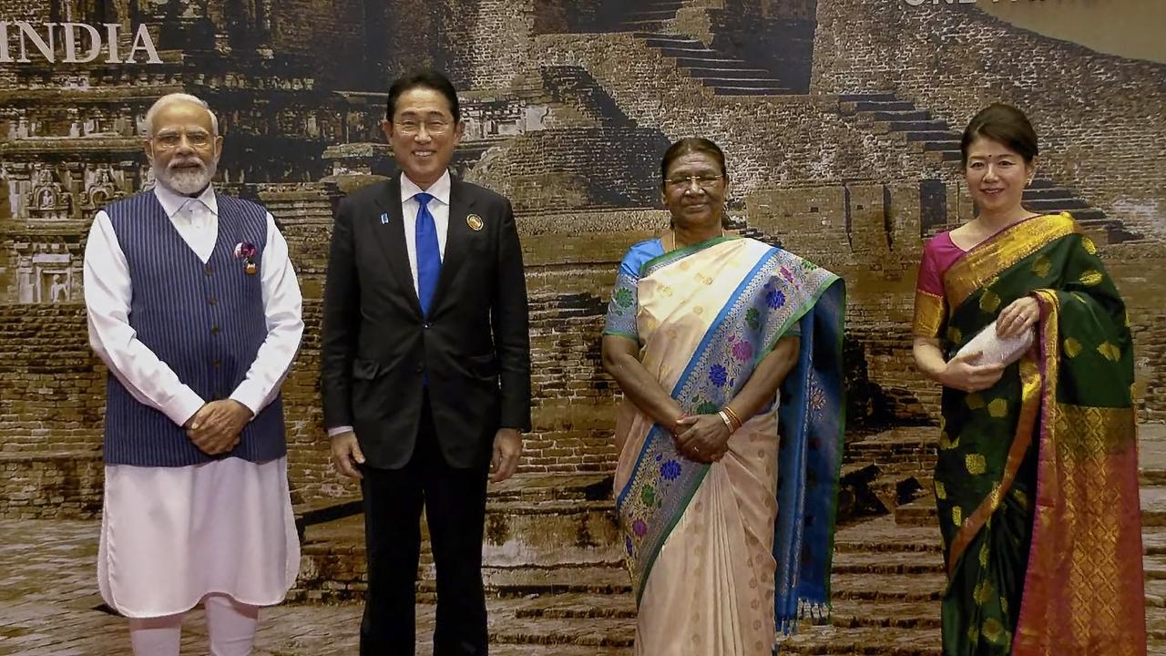 PM Modi and President Murmu welcomed the guests before the start of the dinner at a dais, with its backdrop depicting the ruins of the Nalanda University in Bihar and India's G20 presidency theme -- 'Vasudhaiva Kutumbakam - One Earth, One Family, One Future'
