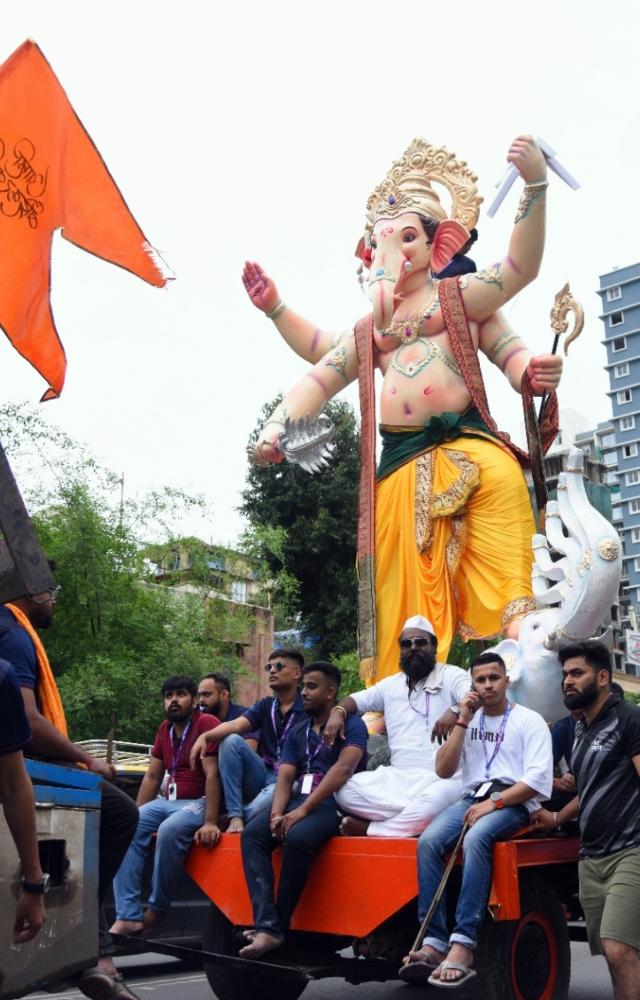 The auspicious occasion is marked by the installation (Sthapana) of Ganesha idols in homes and public spaces, followed by vibrant processions