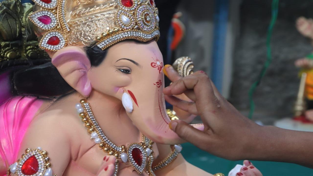 Idols in various shapes and sizes were installed at several households and in pandals against the backdrop of elaborate decorations based on myriad themes ranging from the Chandrayaan-3 launch to Ayodhya's Ram Mandir Idols in various shapes and sizes were installed at several households and in pandals against the backdrop of elaborate decorations based on myriad themes ranging from the Chandrayaan-3 launch to Ayodhya's Ram Mandir