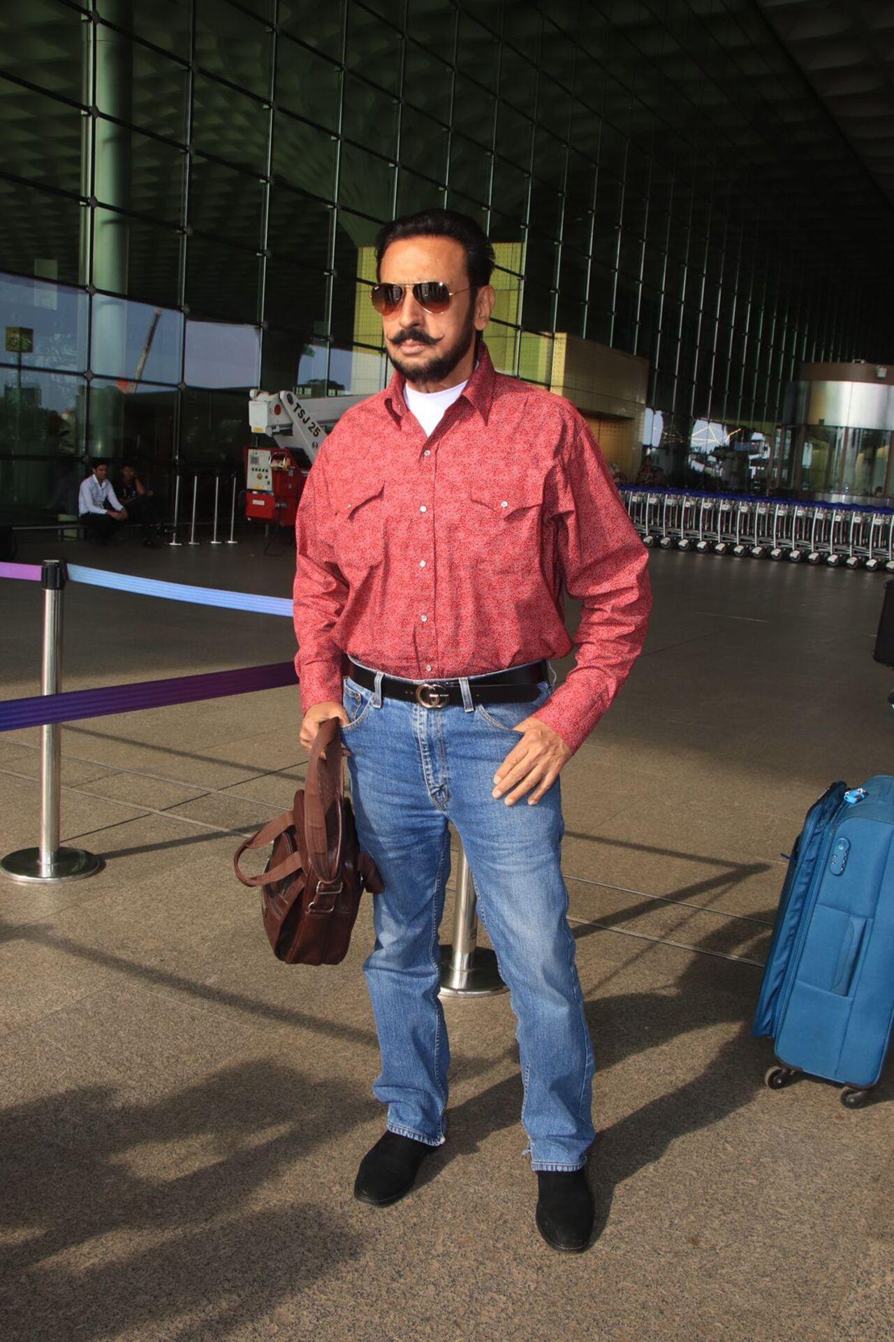 Gulshan Grover posed for the cameras at the airport