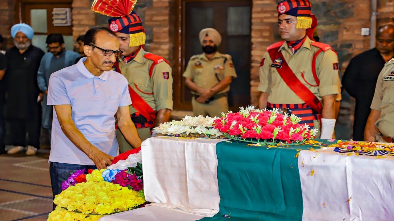 In Photos: Pall of gloom as slain J&K Police DSP laid to rest