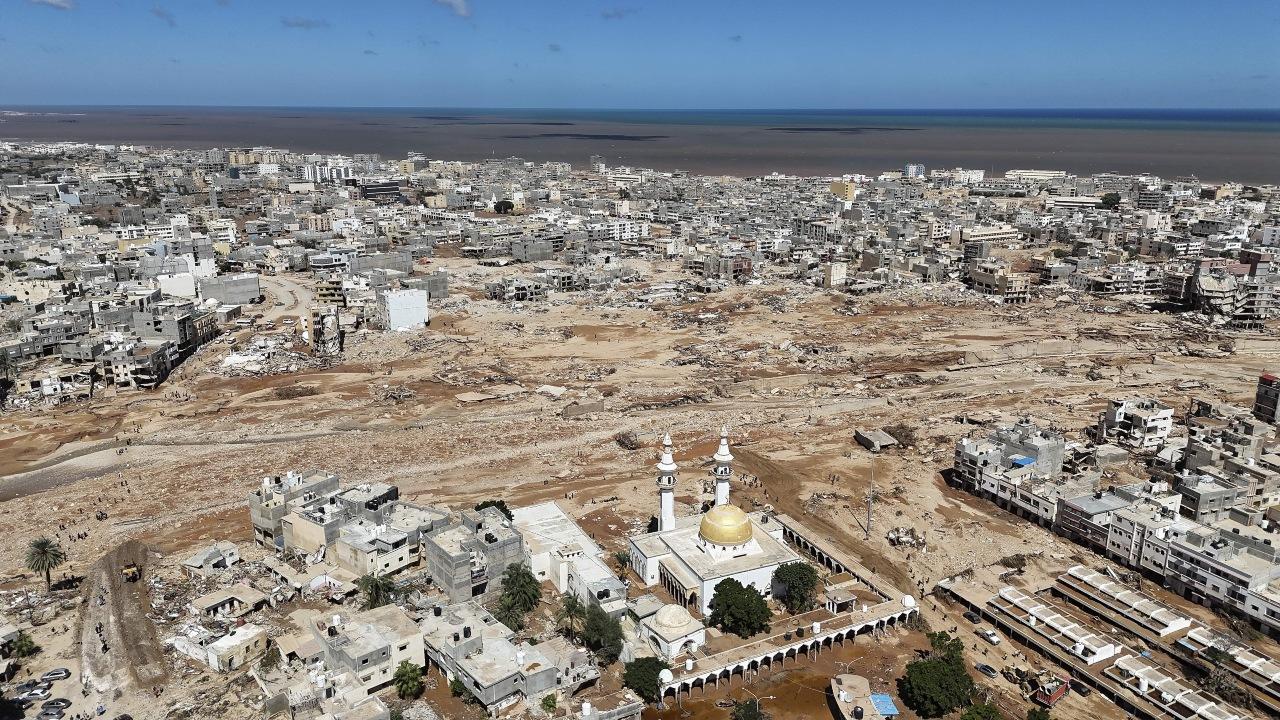 Thousands buried in mass graves in Libyan city of Derna after devastating floods