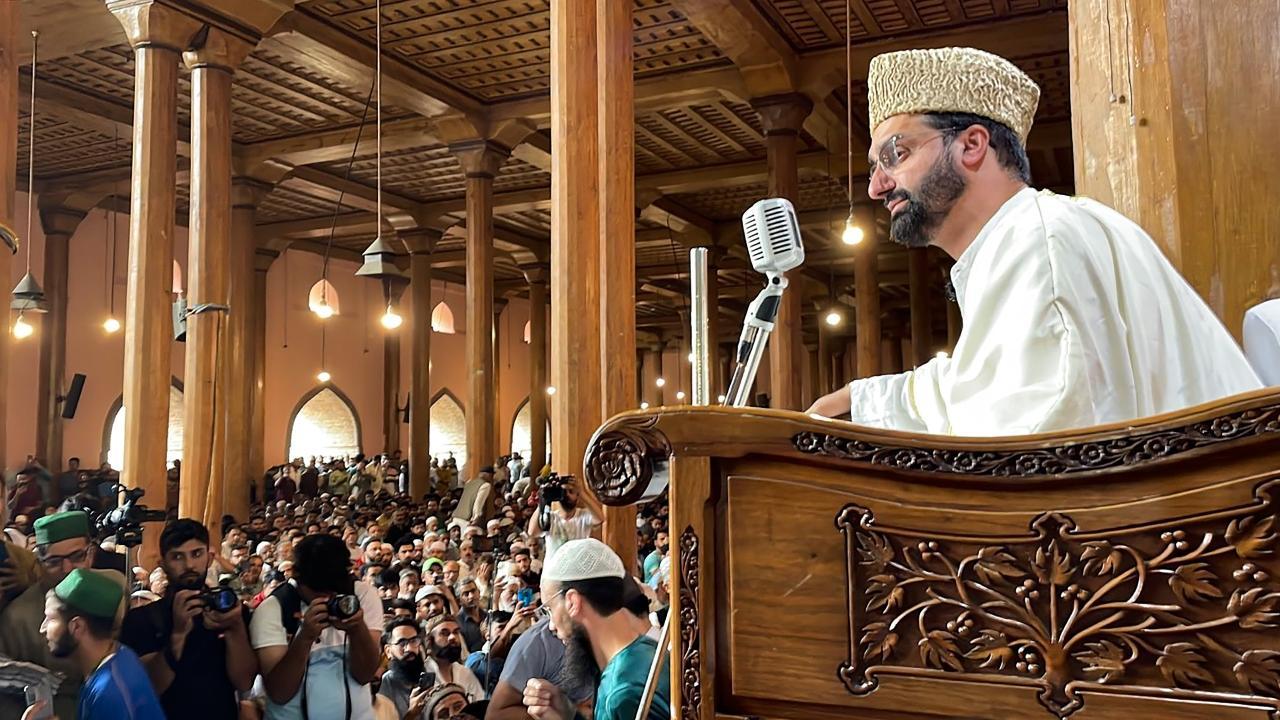    Mirwaiz Umar Farooq delivers sermon during Friday prayers at the Jama Masjid, in Srinagar, Friday, Sept. 22, 2023. PTI