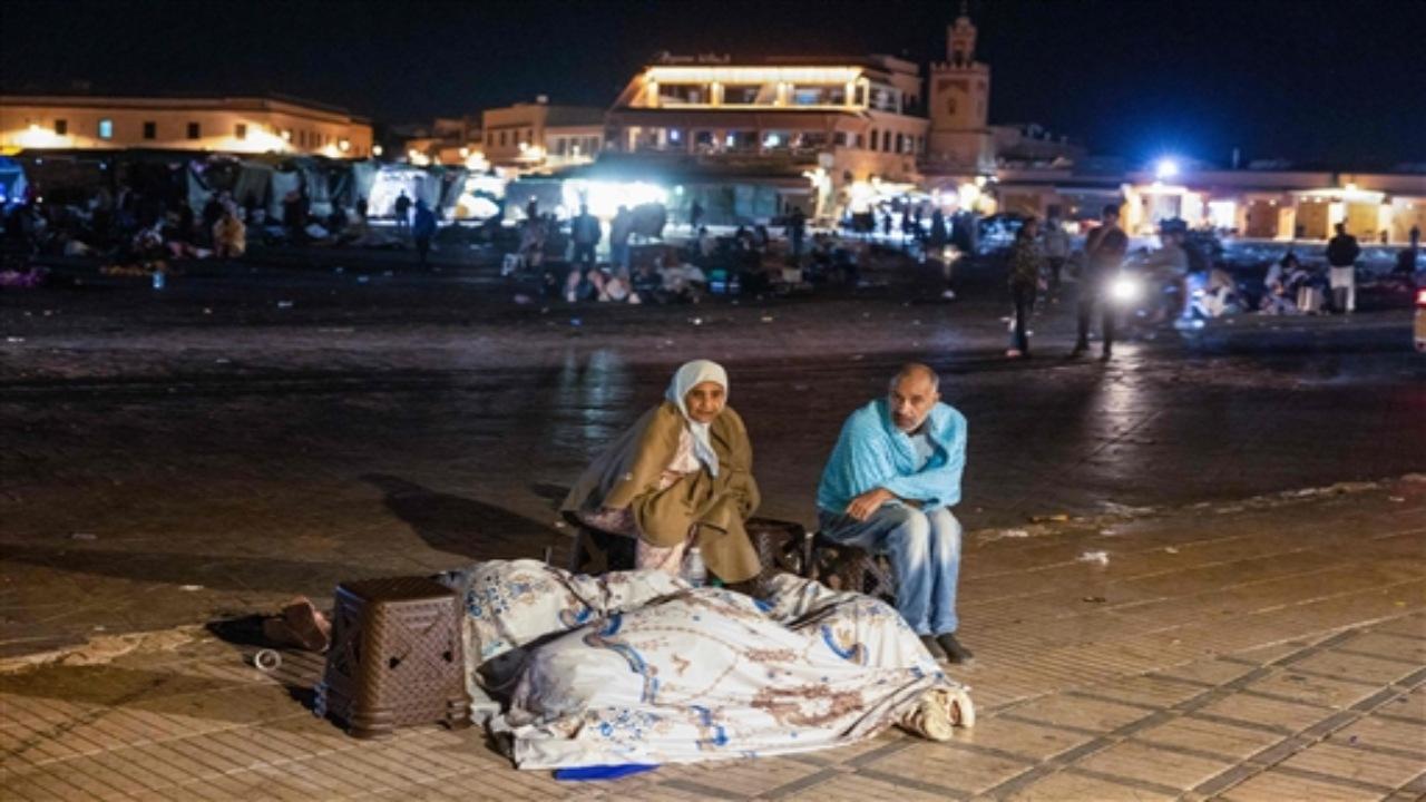 Moroccan television showed scenes from the aftermath, as many stayed outside fearing aftershocks. Anxious families stood in streets or huddled on the pavement, some carrying children, blankets or other belongings.